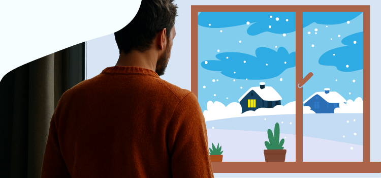 Man-looking-out-a-window-at-a-snowy-landscape Man-looking-out-a-window-at-a-snowy-landscape